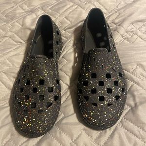 Vans Black Slip-On Loafers with Neon Paint Splatter